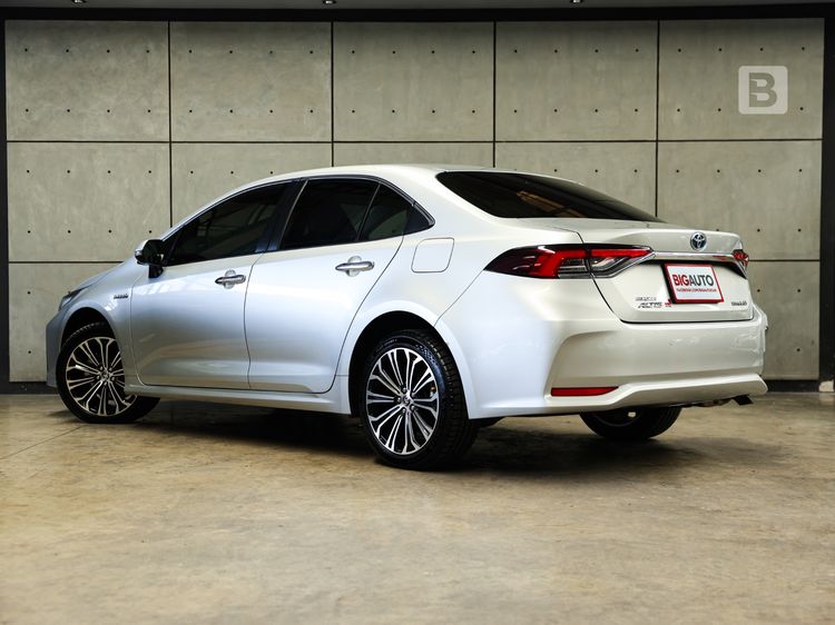 Toyota Altis 2022 1.8 Hybrid Premium Sedan ไฮบริด ไม่ติดแก๊ส เกียร์อัตโนมัติ บรอนซ์เงิน รูปที่ 4