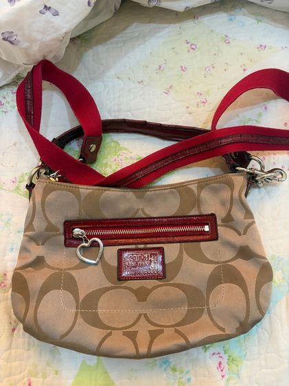 กระเป๋าโค๊ท แท้