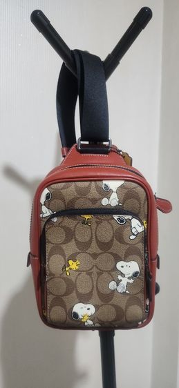 กระเป๋าCoach X Peanuts Track Pack 14 In Signature Canvas With Snoopy Woodstock Print


