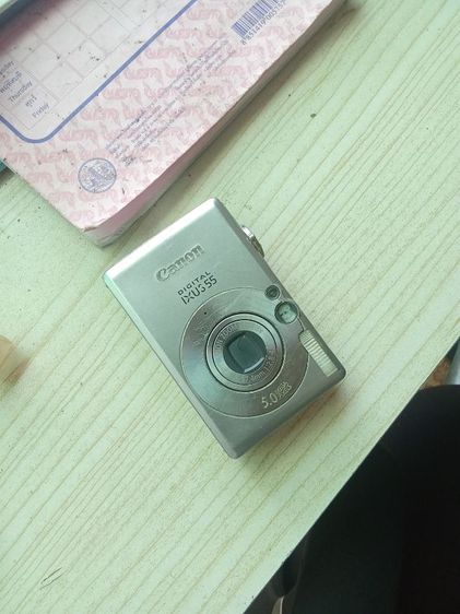 Canon ixus55 ได้มาไม่มีแบต เอาไปลองเอง เครื่องสวยมีเมม จอใสไม่แตก1700รวมส่ง