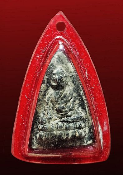 พระเก่าด้านหลังมีรอยยันต์เลี่ยมกรอบเก่า