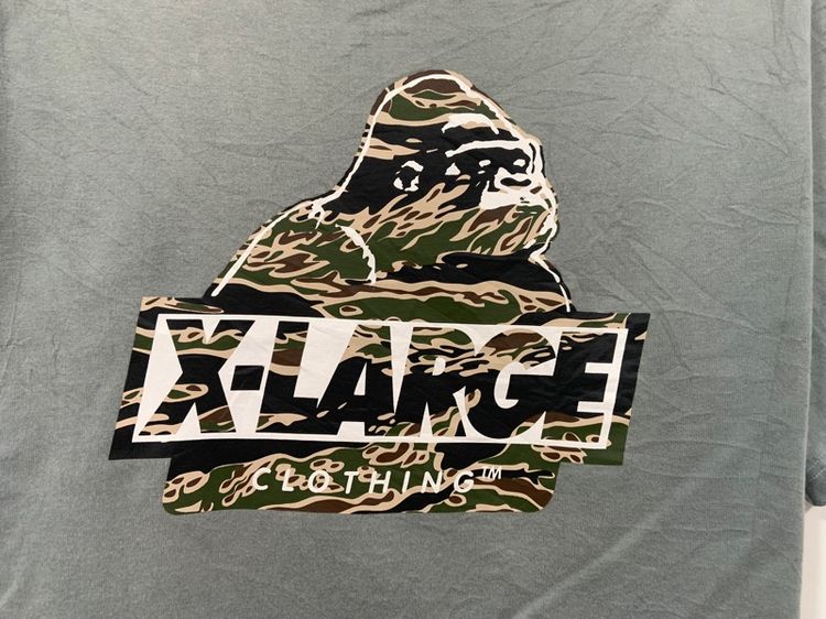 เสื้อยืด X LARGE แท้ 💯 size L ขนาดอก 22 ยาว 28 นิ้ว สภาพใหม่มาก สีเทา ลายโลโก้สวย เนื้อผ้านิ่มมาก หายากน่าสะสมครับ รูปที่ 2