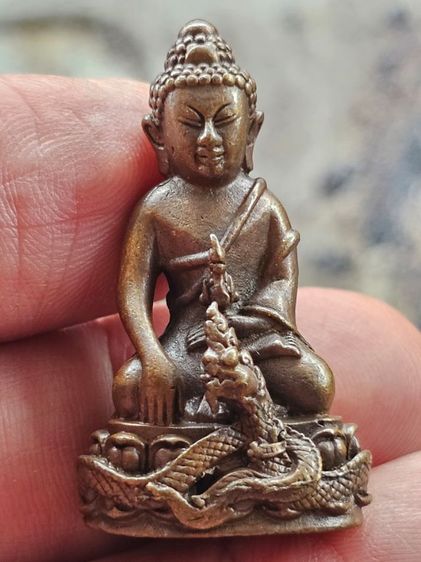 พระกริ่งศรีสุทโธ เนื้อนวะโลหะ รุ่นอายุวัฒนะ หลวงปู่คำบุ วัดกุดชมภู อุบลราชธานี 2554