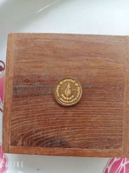 เหรียญกระดุมหลวงปู่ผาด รูปที่ 2