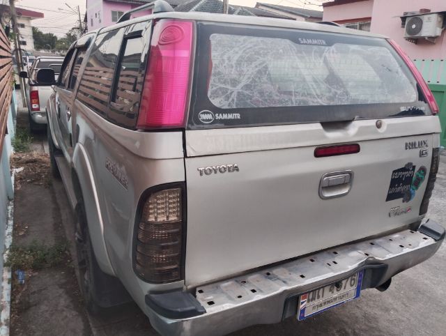 รถ Toyota Hilux Vigo 3.0 สี บรอนซ์เงิน