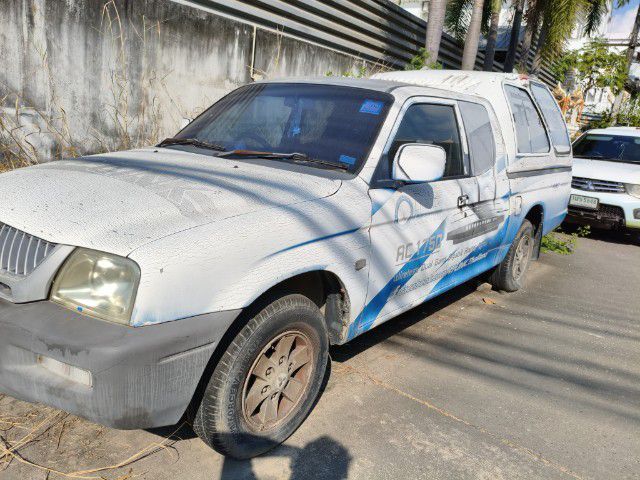 Mitsubishi L200-Strada 2002 รุ่นย่อยอื่นๆ Pickup ดีเซล ไม่ติดแก๊ส เกียร์ธรรมดา บรอนซ์เงิน