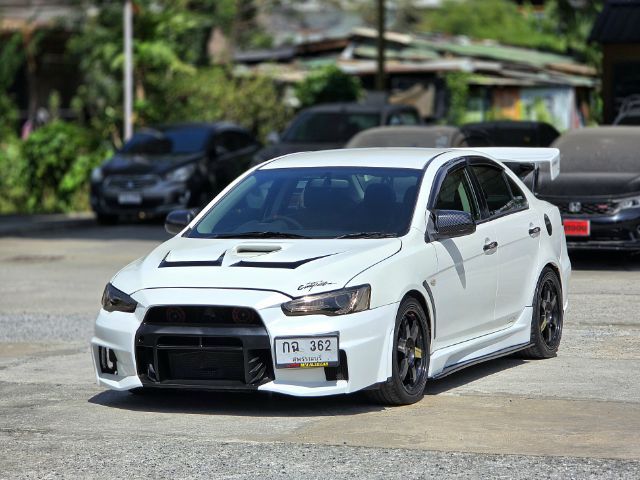 รถ Mitsubishi Lancer 1.8 GLX สี ขาว