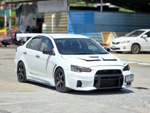 Mitsubishi Lancer 2012 1.8 GLX Sedan เบนซิน ไม่ติดแก๊ส เกียร์อัตโนมัติ ขาว รูปที่ 2