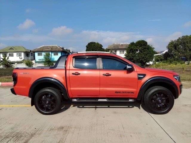 Ford Ranger 2013 2.2 Hi-Rider Wildtrak Pickup ดีเซล เกียร์อัตโนมัติ ส้ม รูปที่ 4