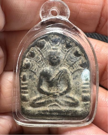 พระนาคปรกสุริยมุนี เนื้อชิน ของหลวงพ่ออั้น วัดพระญาติการาม จังหวัดพระนครศรีอยุธยา พร้อมเลี่ยมกันน้ำเดิม