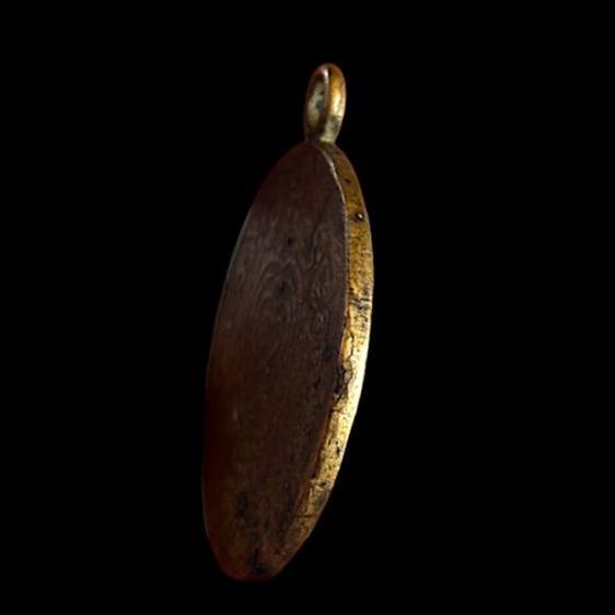 เหรียญกลมหลวงพ่อกลั่น วัดพระญาติ (นักกล้าม) ปี2478
 รูปที่ 3