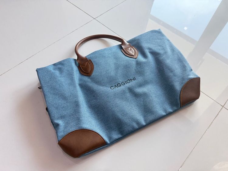 กระเป๋าแบรนด์ CAGGIONI  (ผ้าแคนวางสแต่งหนัง) ขนาด 20 นิ้ว มือสองสภาพไม่ผ่านการใช้งาน