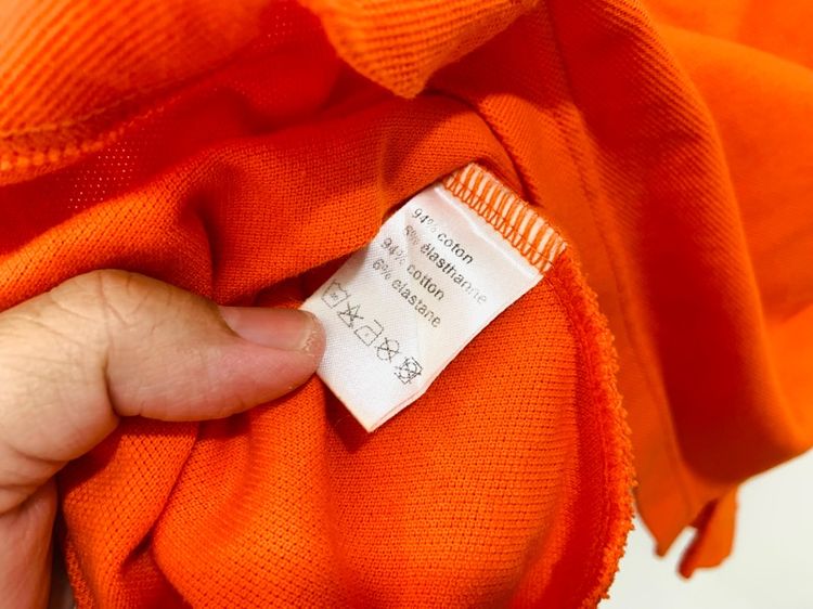 เสื้อโปโล LACOSTE แท้ 💯 size 5 ขนาด อก 21 ยาว 27.5 นิ้ว สภาพใหม่มาก สีส้มสดมาก ทรงสวย ผ้านิ่มหายากน่าสะสมครับ รูปที่ 6