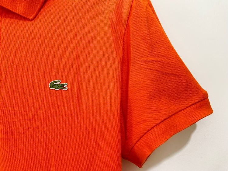 เสื้อโปโล LACOSTE แท้ 💯 size 5 ขนาด อก 21 ยาว 27.5 นิ้ว สภาพใหม่มาก สีส้มสดมาก ทรงสวย ผ้านิ่มหายากน่าสะสมครับ รูปที่ 2