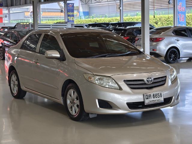 รถ Toyota Altis 1.6 J สี บรอนซ์ทอง