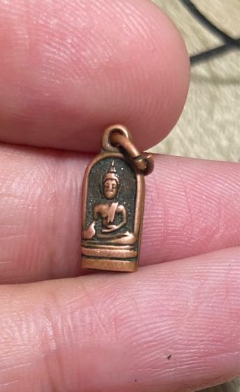 เหรียญใบมะขาม หลังนางกวัก