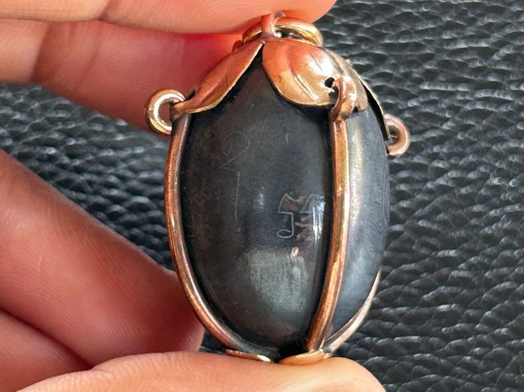 ตะกรุดลูกอมไม่ทราบที่เลี่ยมจับขอบ รูปที่ 15