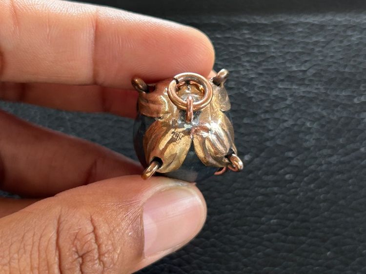 ตะกรุดลูกอมไม่ทราบที่เลี่ยมจับขอบ รูปที่ 16