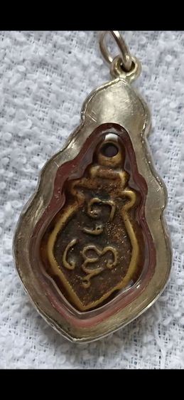 เหรียญหล่อ โบราญ รุ่นแรก หลวงพ่อวัดไร่ขิง (ก้นแมงดา) รูปที่ 10