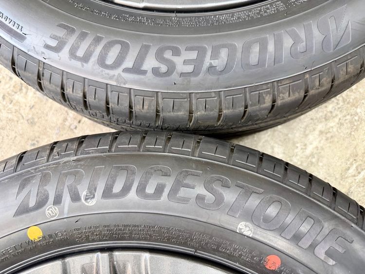 ยางถอดป้ายแดงขอบ 17” ยี่ห้อ BRIDGESTONE รุ่น ALENZA HL33 ขนาด 215-60R17 ปี 26 สีเส้นตุ่มหน้ายางยังอยู่