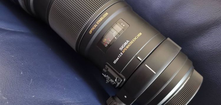 เลนส์ซูม ปล่อยเลนส์ฟิกเทพๆหายาก สภาพไม่ได้ใช้ sigma 180 f2.8 ตัวมีกันสั่น OS for canon ef 
