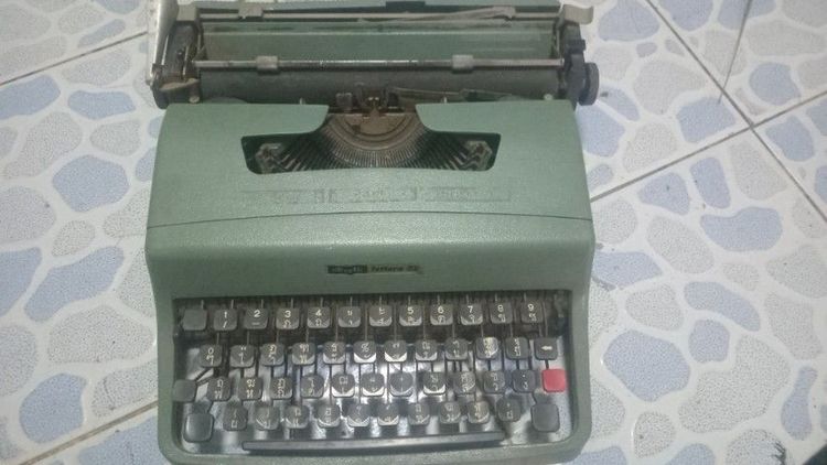 พิมดีดเก่าโอลิมเปีย รูปที่ 6