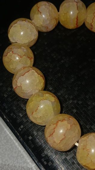 อัญมณี สร้อยข้อมือหินนำโชคไหมทองตามภาพ