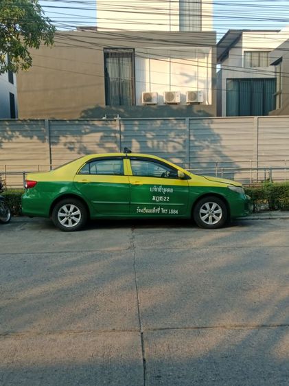 Toyota Corolla 2012 1.6 DXi Sedan เบนซิน NGV เกียร์ธรรมดา เหลือง รูปที่ 2