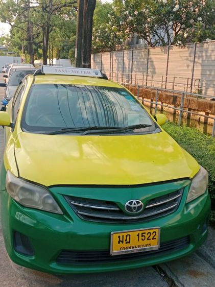 Toyota Corolla 2012 1.6 DXi Sedan เบนซิน NGV เกียร์ธรรมดา เหลือง รูปที่ 3