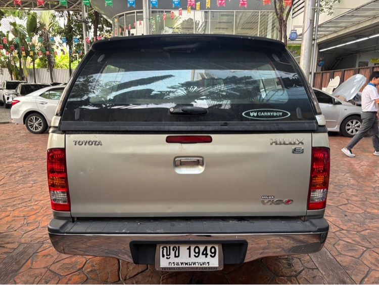 Toyota Hilux Vigo 2010 2.7 E Pickup เบนซิน ไม่ติดแก๊ส เกียร์ธรรมดา บรอนซ์เงิน รูปที่ 3