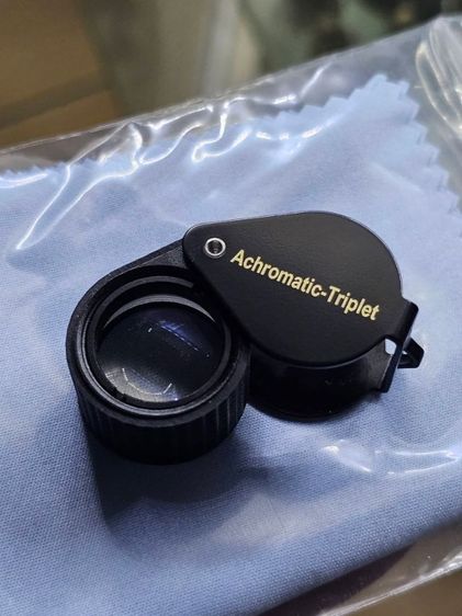 Canon Triplet 10x18mm สีดำหุ้มยางเลนส์แก้ว 3ชั้นแบบ อะโครเมติก เคลือบมัลตโค๊ตสีฟ้าตัดแสงสะท้อน ตัวจับหุ้มยางกันลื่น พร้อมซองหนัง แถมฟรีผ้าเช็ดเลนส์ ของใหม่ นำเข้าจากญี่ปุ่น รูปที่ 3