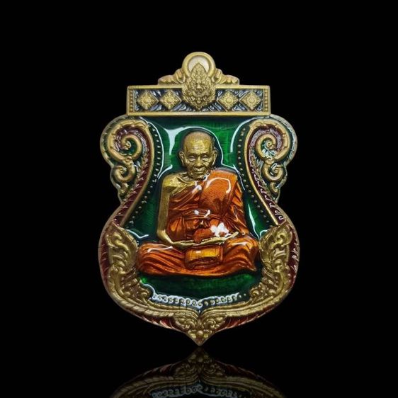 เหรียญเสมารวยมหาอำนาจ หลวงปู่อิ่ม วัดทุ่งนาใหม่
ด้านหลังพญาครุฑหยุดนาค