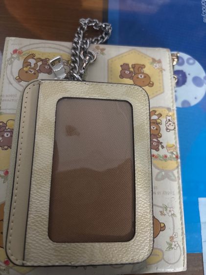 กระเป๋าใส่บัตรใส่เงินได้ coach แท้มือสอง สภาพ100สีเหลืองอ่อน รูปที่ 2