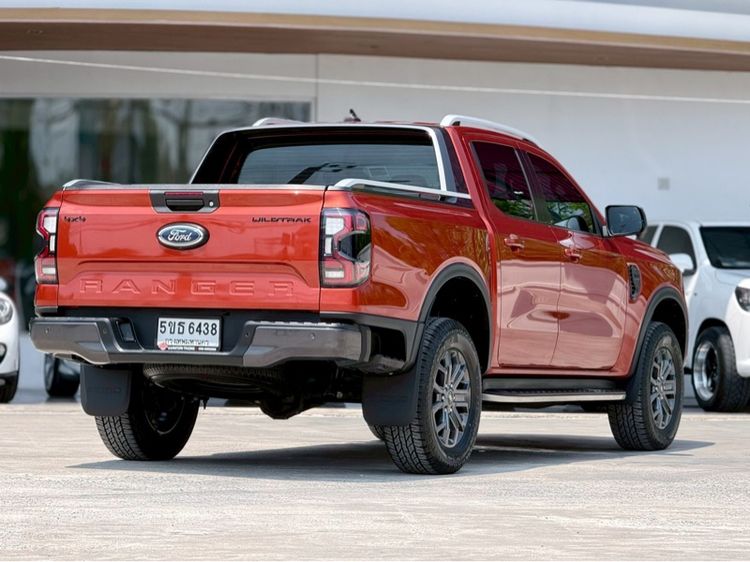 Ford Ranger 2023 2.0 Bi-Turbo 4WD Wildtrak Pickup ดีเซล ไม่ติดแก๊ส เกียร์อัตโนมัติ ส้ม รูปที่ 4