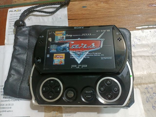เครื่องเล่นเกมส์พกพา Sony PSP GO PSP-N1001 มือสองสภาพดี ความจุ 16gb.พร้อมเมม สายชร์าจ มีเกมส์ในเครื่อง ปุ่มลื่นแบตอึด มีเคสหลัง เดิมทั้งหมด รูปที่ 2