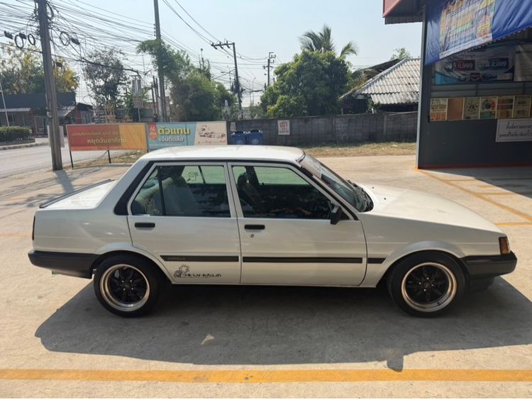 รถ Toyota Corolla 1.3 DXi สี ขาว