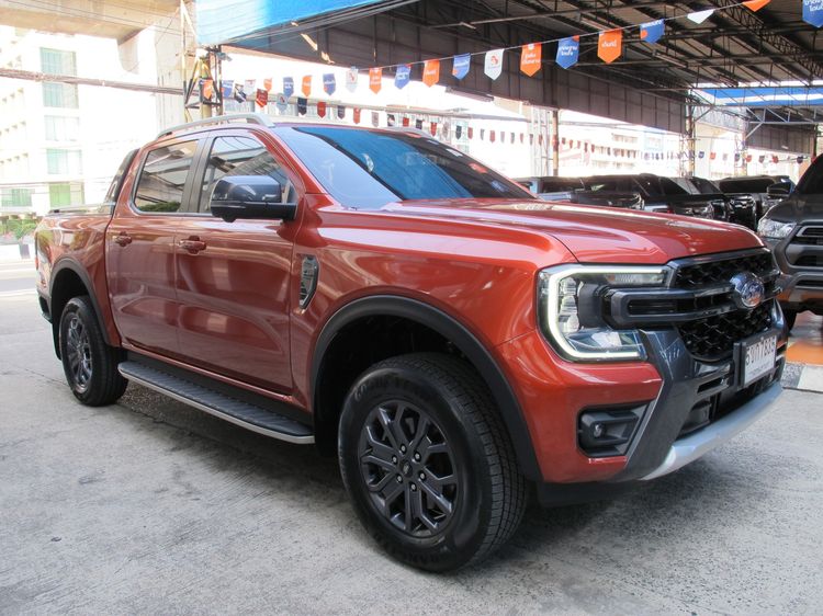 Ford Ranger 2024 2.0 Bi-Turbo Hi-Rider Wildtrak Pickup ดีเซล ไม่ติดแก๊ส เกียร์อัตโนมัติ ส้ม รูปที่ 2