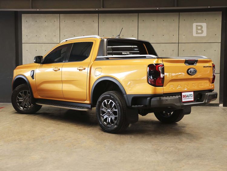 Ford Ranger 2023 2.0 Hi-Rider Wildtrak Pickup ดีเซล ไม่ติดแก๊ส เกียร์อัตโนมัติ เหลือง รูปที่ 4