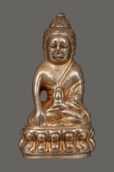 พระกริ่งปวเรศเนื้อแก่นาก