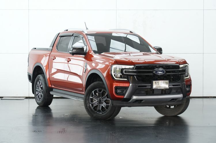 Ford Ranger 2023 2.0 Bi-Turbo 4WD Wildtrak Pickup ดีเซล ไม่ติดแก๊ส เกียร์อัตโนมัติ ส้ม รูปที่ 2