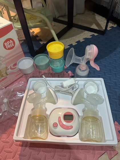 เครื่องปั๊มนมแถมกระปุกเก็บน้ำนมและ ที่ปั๊มมือ