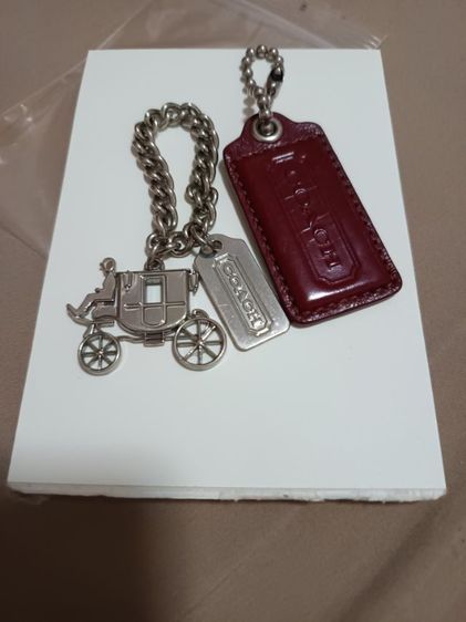 พวงกุญแจโค้ชมือ2สภาพใหม่กดดูนะคชามร์รถม้าพร้อมแท้กหนังะ รูปที่ 3