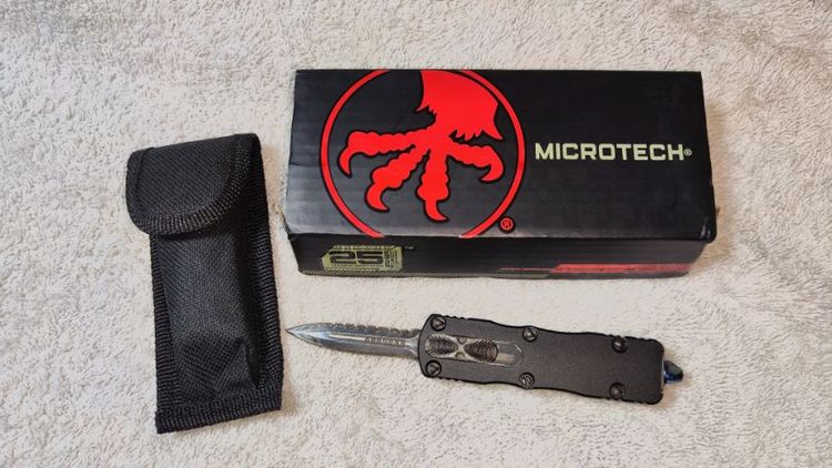 มีดสปริงตรง