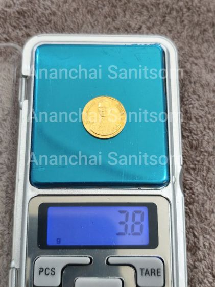 เหรียญทองคำ1500 บาทรัชมังคลาภิเษก รูปที่ 2