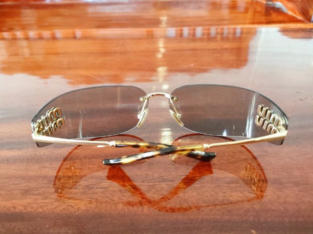 แว่นกันแดด Miu Miu แท้ มือสอง สภาพสวยคับ รูปที่ 6