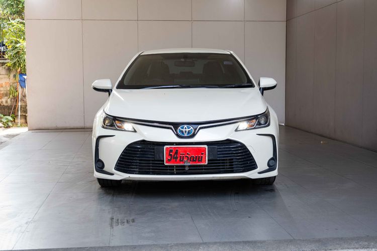 Toyota Altis 2021 1.8 Hybrid Entry Sedan ไฮบริด ไม่ติดแก๊ส เกียร์อัตโนมัติ ขาว รูปที่ 2