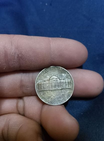 เหรียญที่ปรากฏในภาพคือ เหรียญนิกเกิล 5 เซนต์เป็นชุดพิเศษที่หายากมาก เคยมีการประมูลสูงสุดถึง 32,900 ดอลลาร์ 
NGC
NGC รูปที่ 2