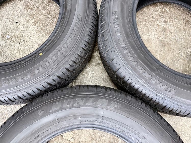 ยางถอดป้ายแดงขอบ 18” ยี่ห้อ DUNLOP รุ่น GRANDTREK PT22 ขนาด 265-60R18 ปี 26 สีเส้นตุ่มหน้ายางยังอยู่
