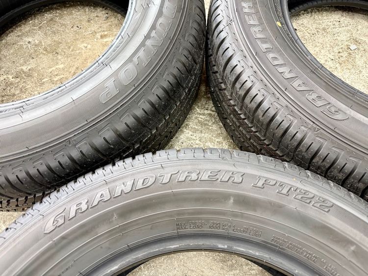 ยางถอดป้ายแดงขอบ 18” ยี่ห้อ DUNLOP รุ่น GRANDTREK PT22 ขนาด 265-60R18 ปี 26 สีเส้นตุ่มหน้ายางยังอยู่ รูปที่ 2