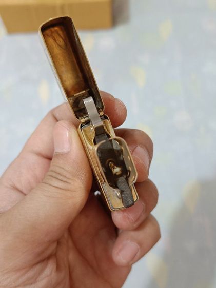 Zippoทองเหลืองลายทอง100G รูปที่ 6